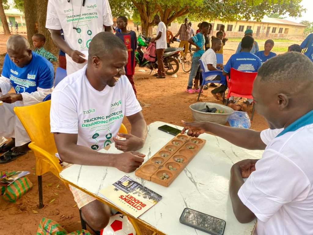 Community Champions challenging each other to a game of "Oware" during the Hangout Event in Bimbilla