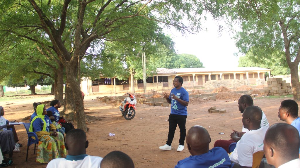 Mr. Peter Dolo, speaking on project tracking experiences with the Community Champions