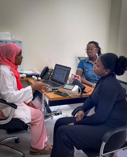 Dr. Suliat from Medifem educating the BudgIT Ghana team during the 2025 Breast Cancer Awareness Month