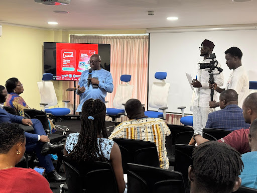 Dr. Alex Kombat, Deputy Commissioner of Ghana Revenue Authority Engaging Participants at the launch